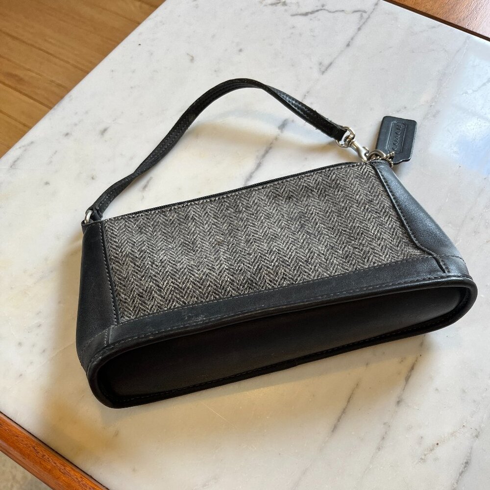 Coach leather and herringbone clutch.